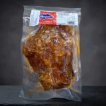 Papada Iberico Melquiades – začinjeni svinjski podbradak u vakuumskom pakiranju.